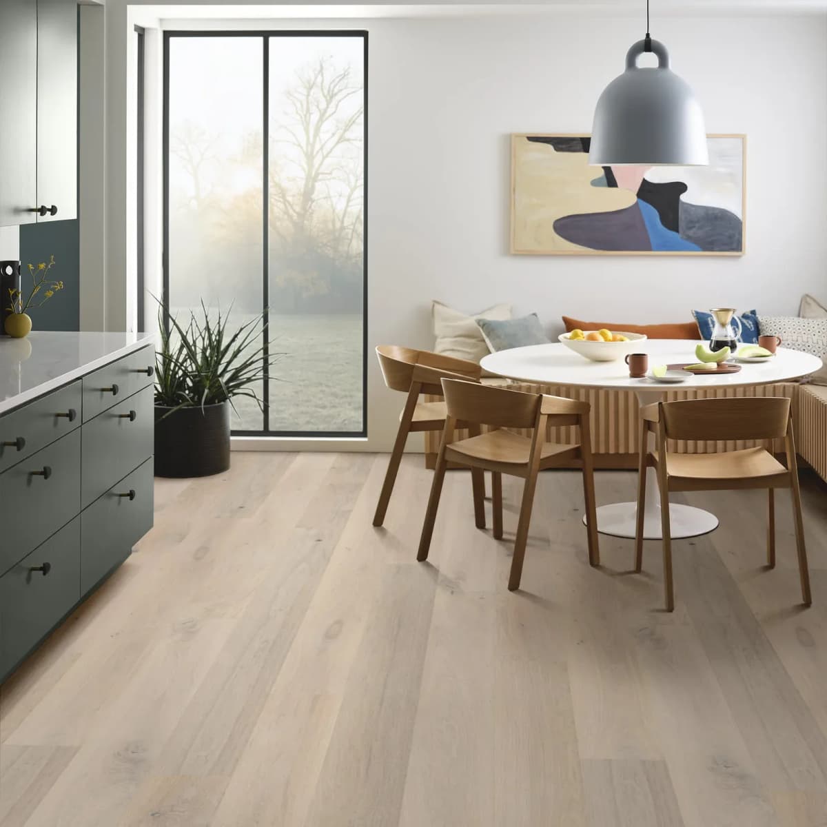 Anderson Tuftex Chateau Oak wide-plank white oak flooring running through a bright kitchen and dining space