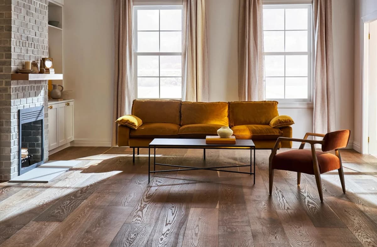 Anderson Tuftex Grand Estate wide-plank white oak flooring stretching across a sunlit living room