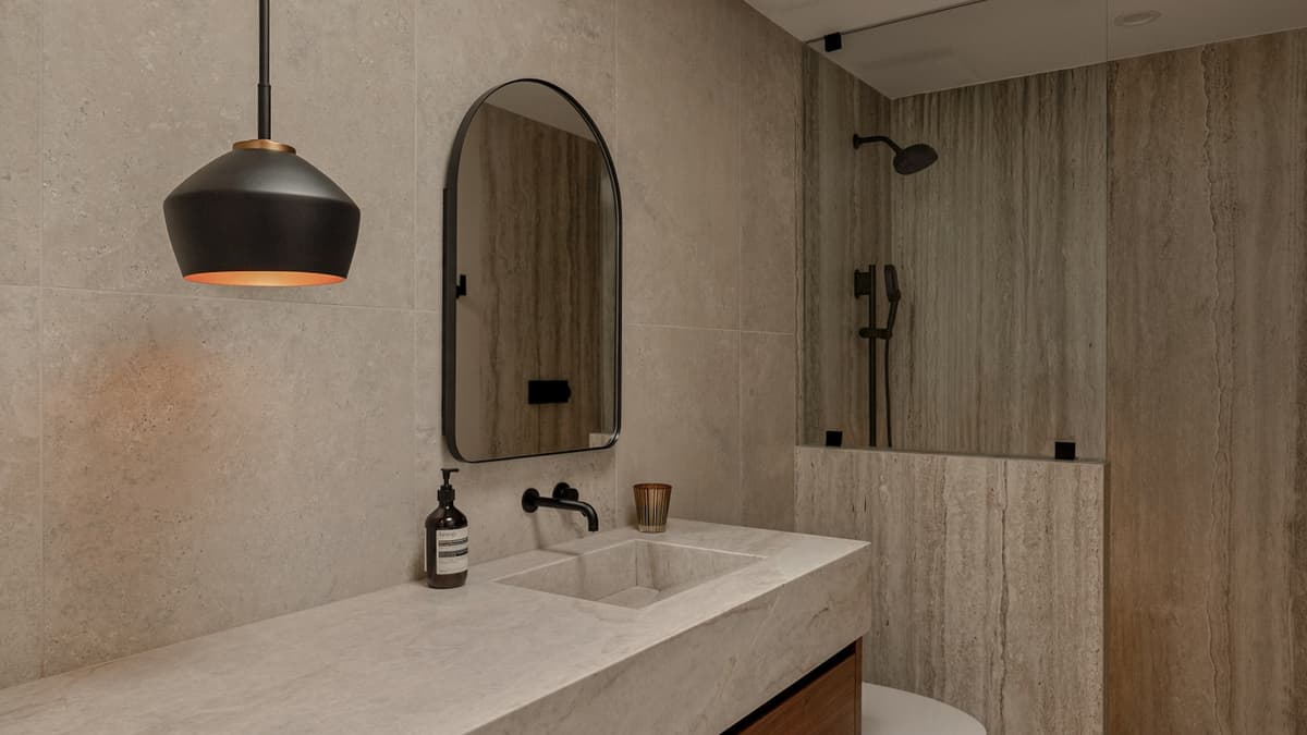 Modern bathroom with waterproof luxury vinyl plank flooring in a wood look