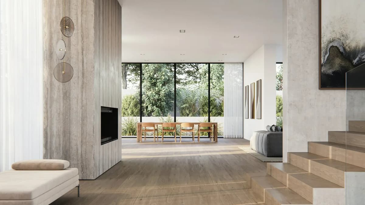 Oak-look plank floor running through an open living and dining space past a stone-clad fireplace and a wood staircase