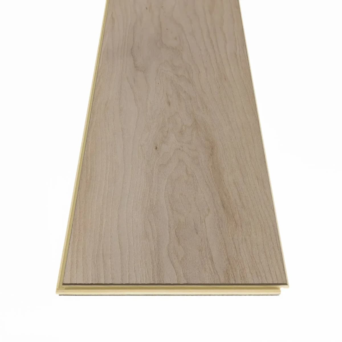 Close-up angled view of a COREtec Coastal Dune Maple plank showing its wood-grain face and edge