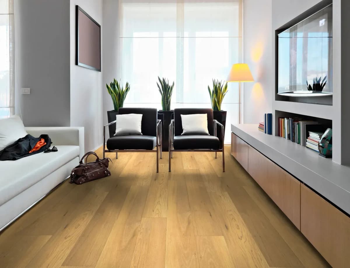 Essex Maple COREtec luxury vinyl plank flooring in a modern living room with large windows