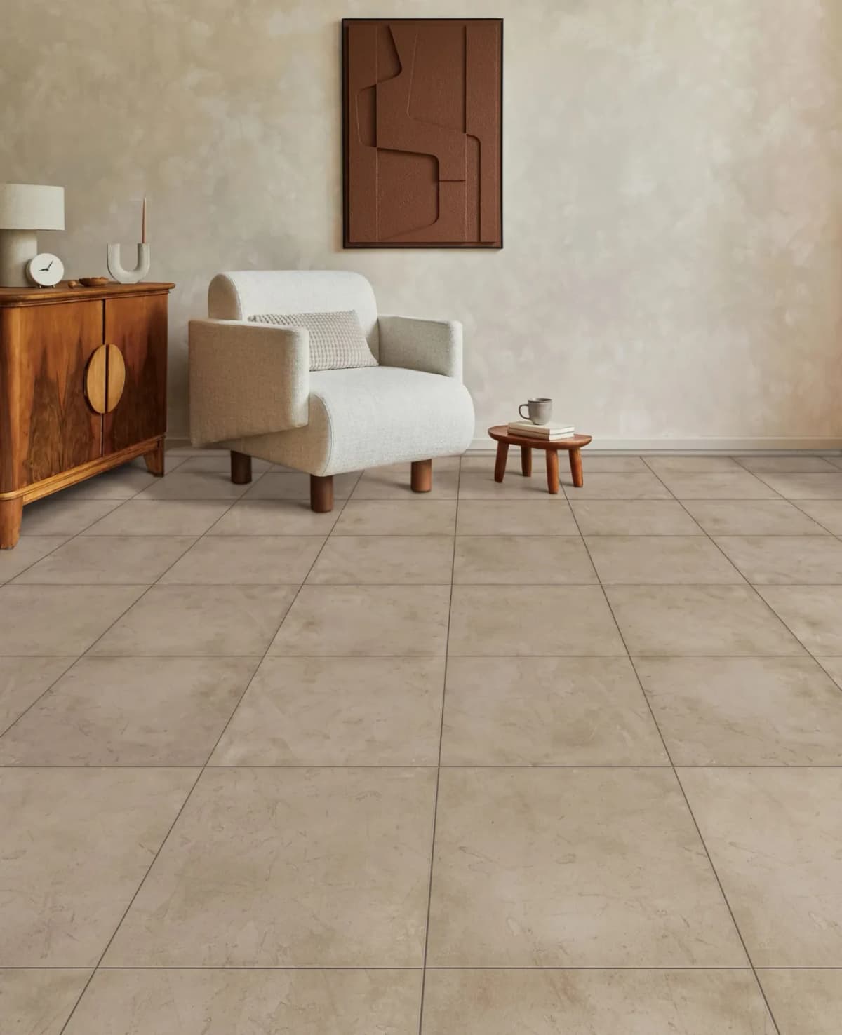 COREtec photo of Tile SPC 18 in Raw Terra Cotta, an earthy terra cotta look, showing its square tile visual in a bright, minimally furnished room.