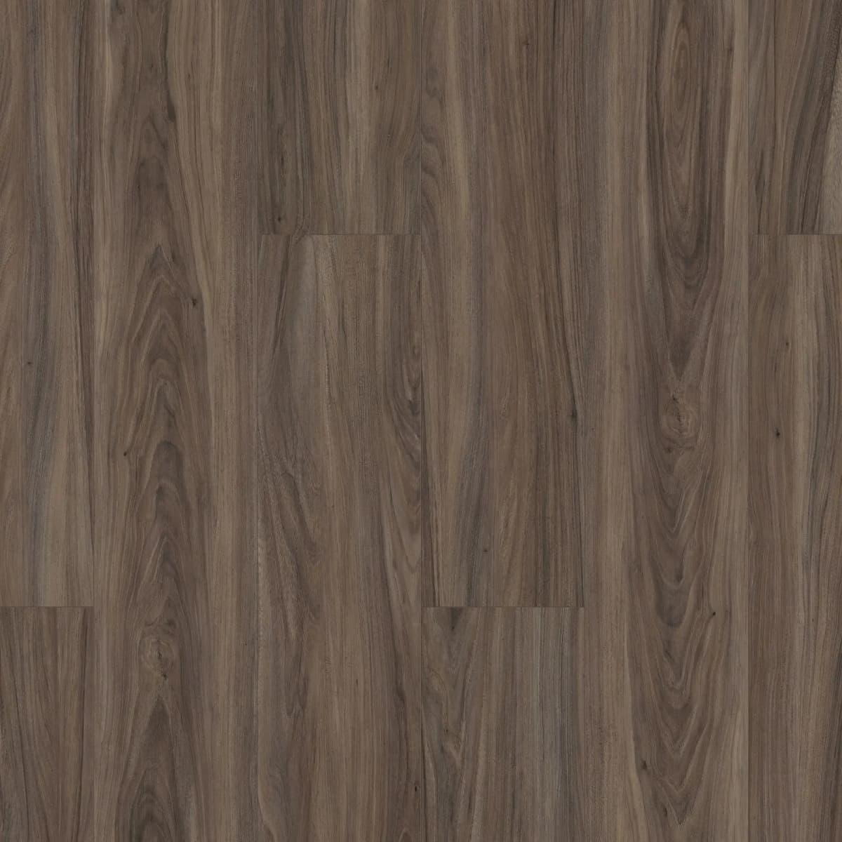 Close-up of Cinnamon Walnut luxury vinyl plank flooring showing its wood grain texture and color variation