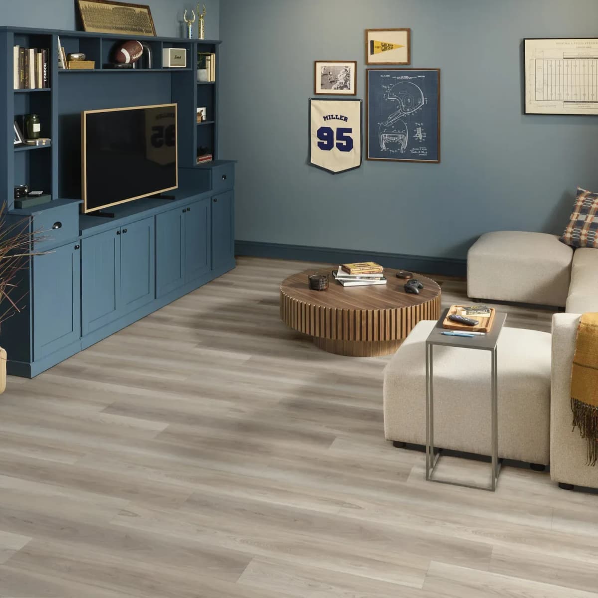 Lighthouse luxury vinyl plank flooring laid in straight, evenly staggered courses across a modern living room