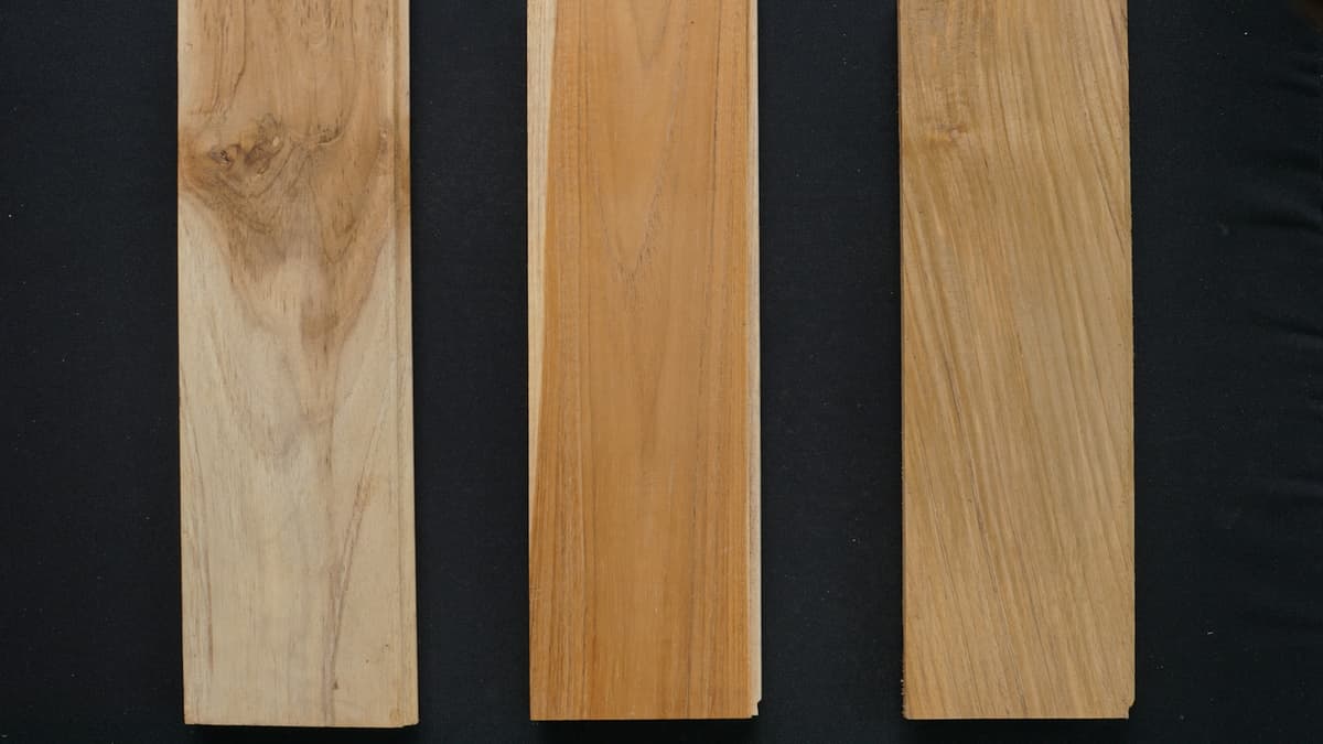 Side-by-side comparison of luxury vinyl plank and engineered hardwood flooring samples