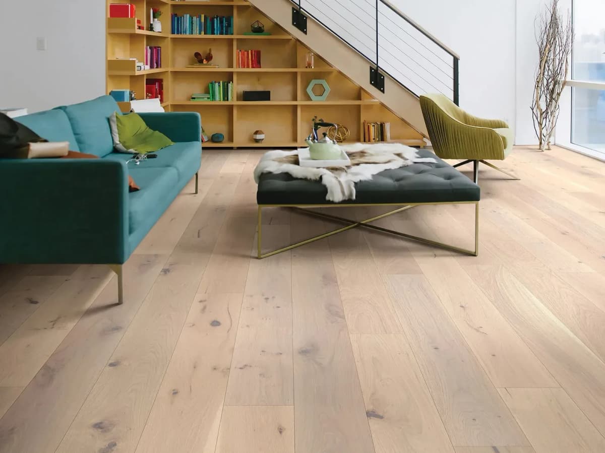 Sonata white oak hardwood flooring spans a bright, modern loft-style living room