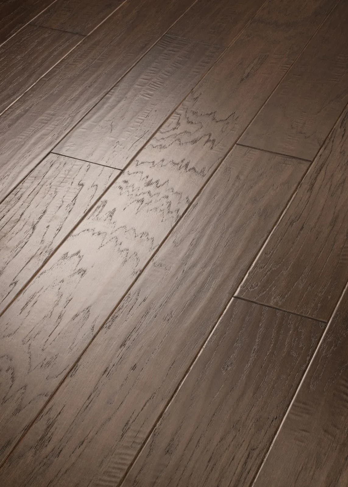 Angled close-up of Fremont Hickory engineered flooring showing plank seams and rich wood grain
