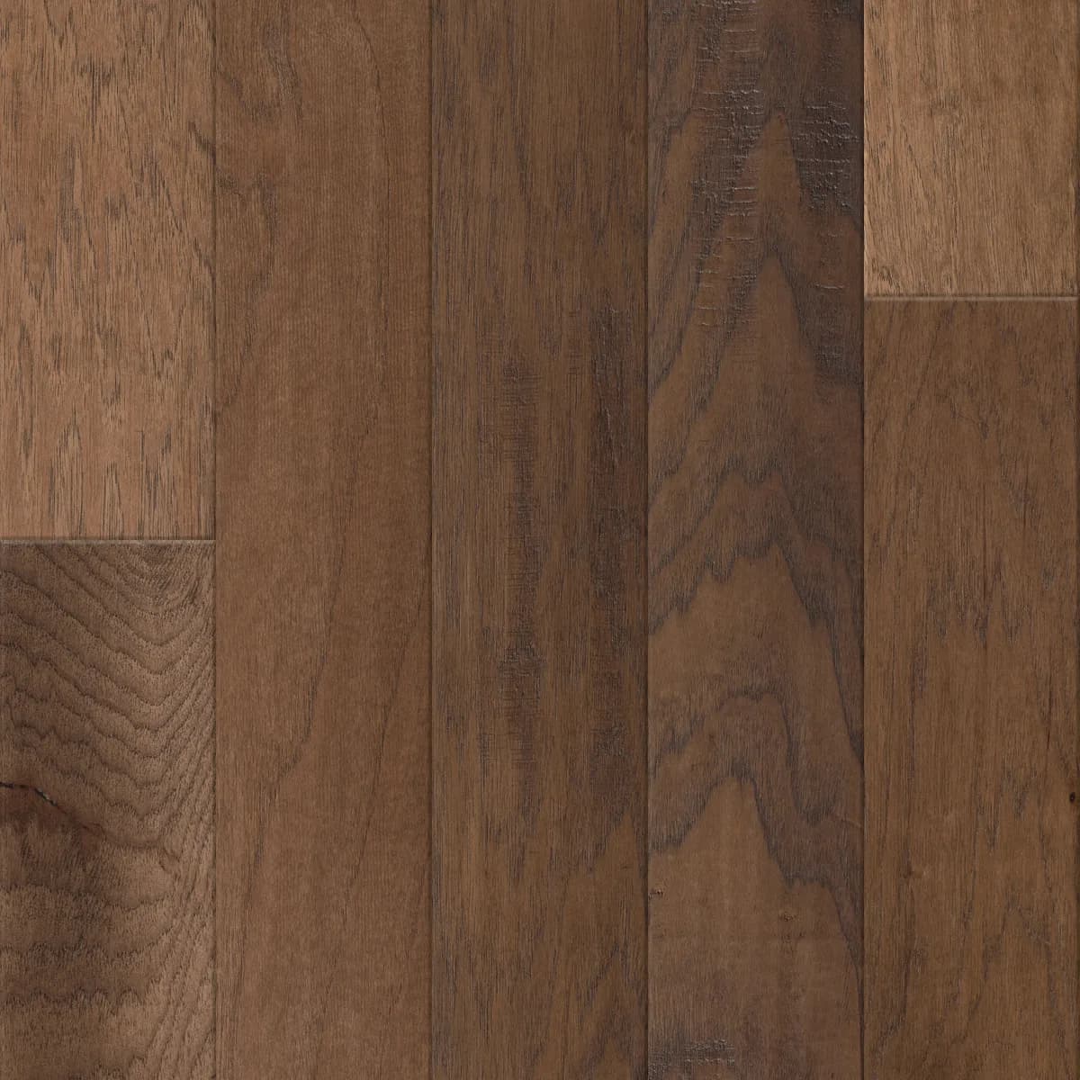 Hickory plank flooring in warm medium-brown tones with visible scraped texture and grain variation.
