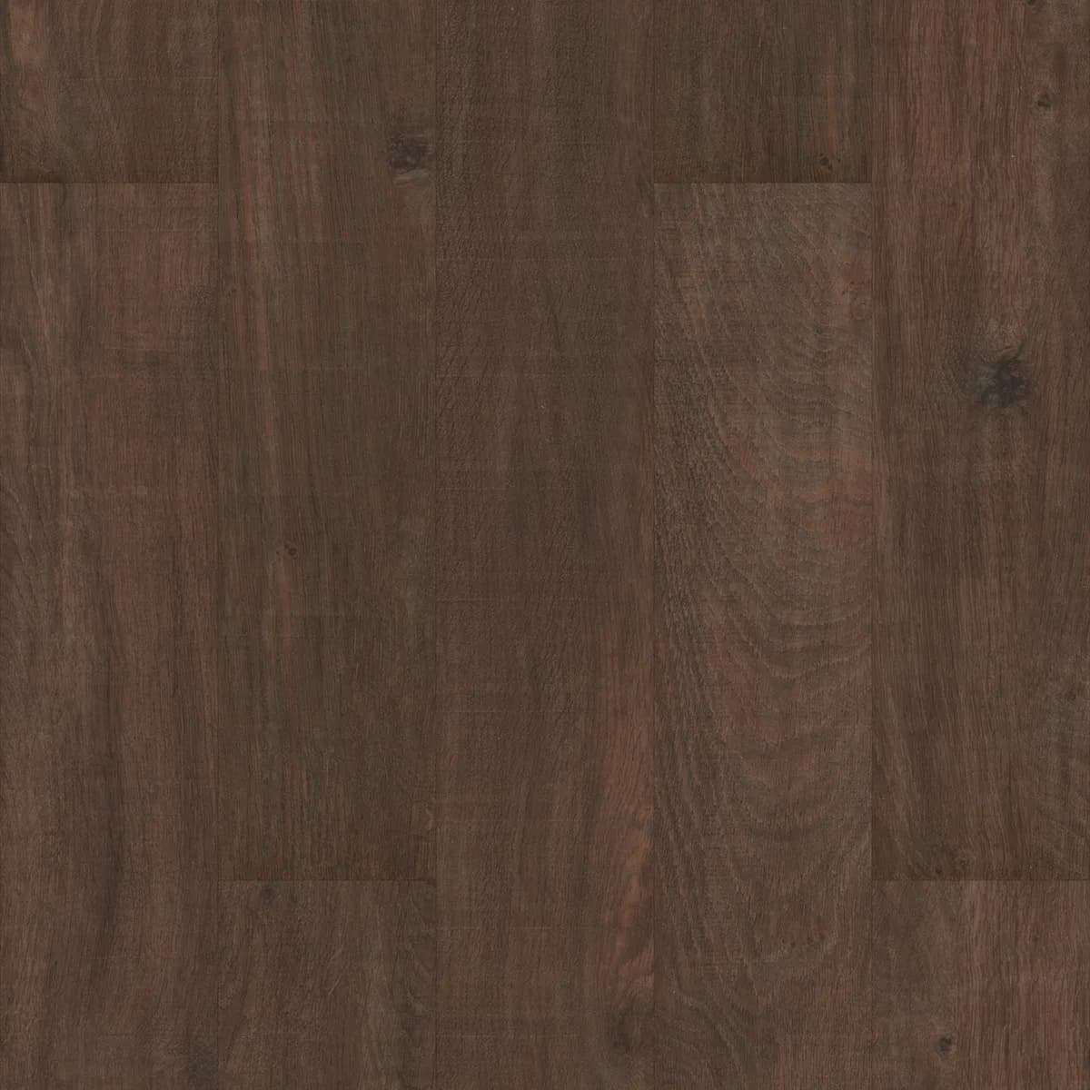 Close view of COREtec luxury vinyl planks in a deep brown tone with embossed wood grain.